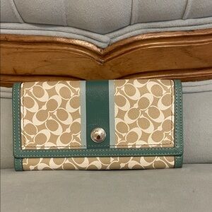 PRE-LOVED COACH TAN AND GREEN SIGNATURE WALLET.
